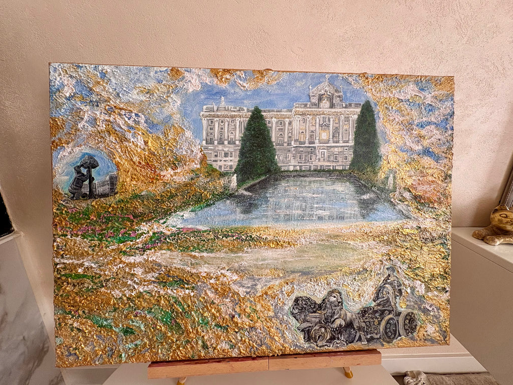 An impressionistic oil painting of a grand palace, a reflective pond, and autumn foliage, displayed on a wooden easel in an indoor setting. Semi-abstract textured art; impasto art